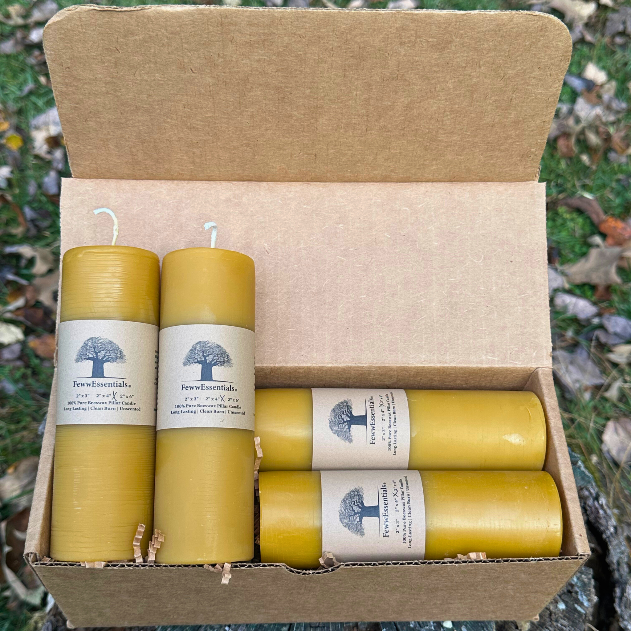 FewwEssentials 4-pack 2x6 pure beeswax candles with clean burn, handmade natural candles in recyclable packaging.